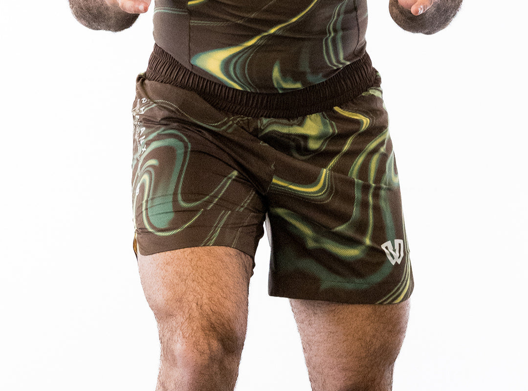 Brown and green no-gi jiu jitsu rash guard and shorts kit