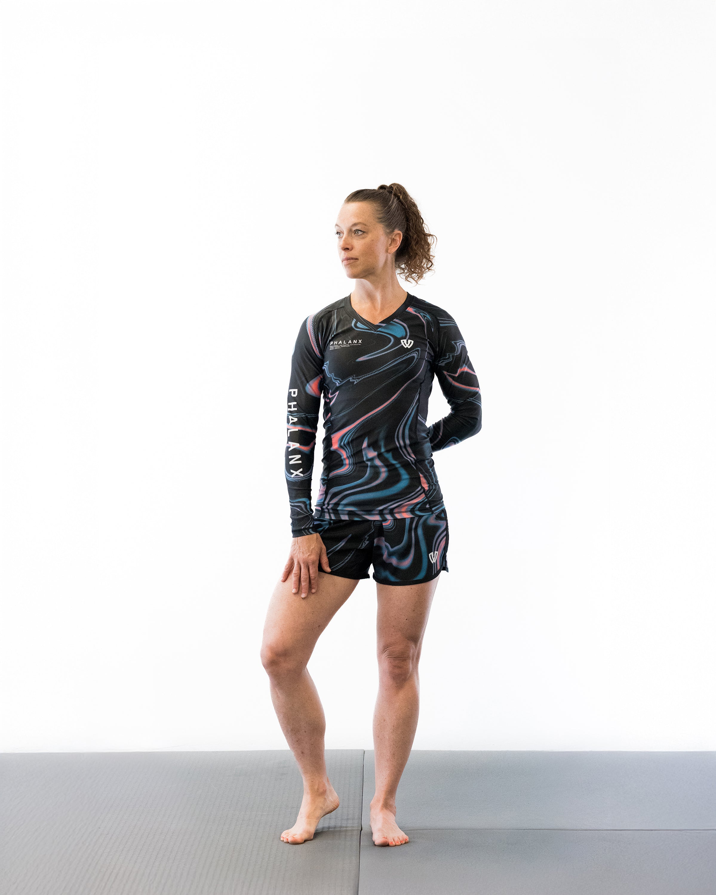 Black with swirls women's jiu jitsu rash guard