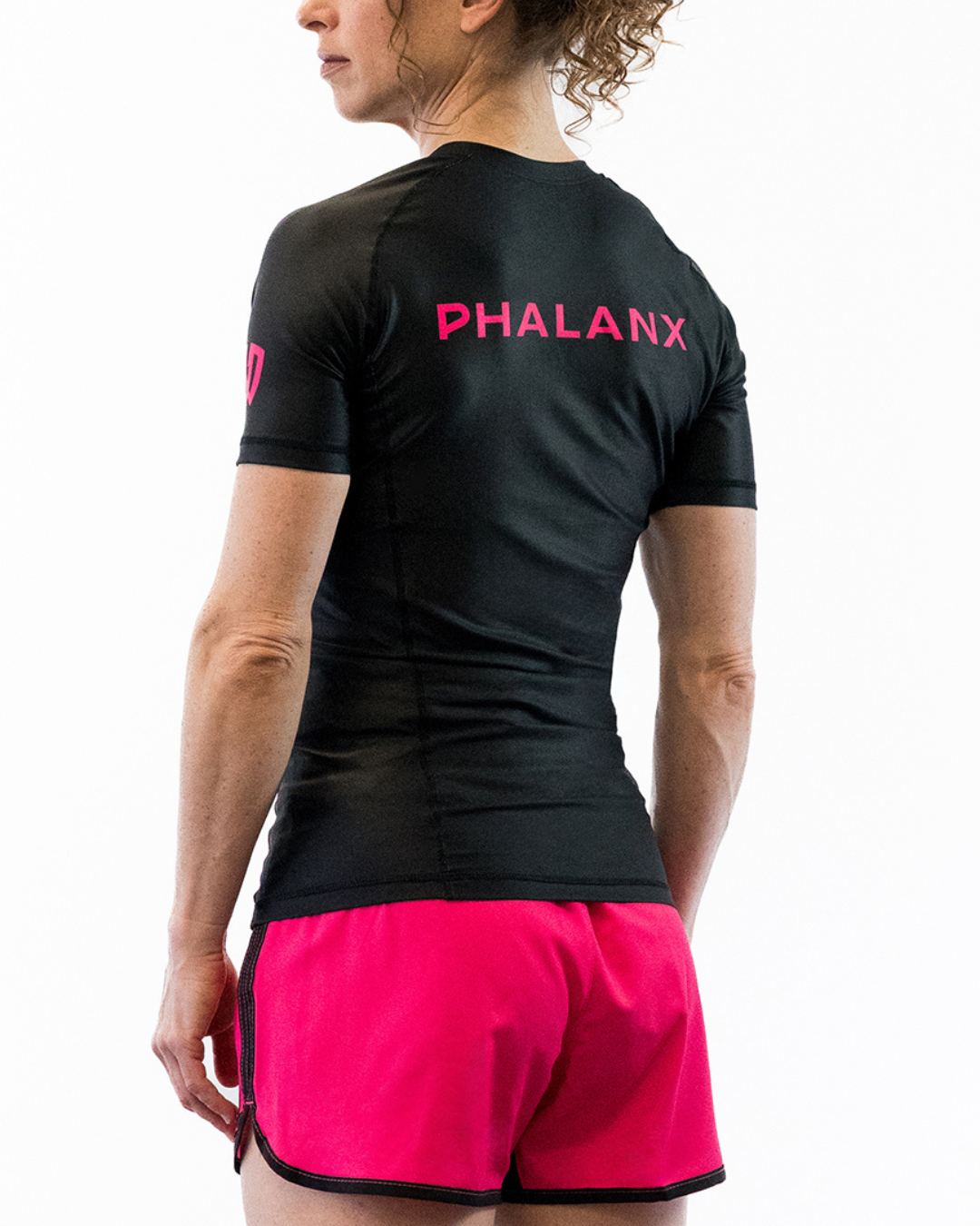 Phalanx Women's Jiu-jitsu BJJ short-sleeve rash guard is perfect for training jiu-jitsu, no-gi grappling, MMA—mixed martial arts, Brazilian Jiu-jitsu, wrestling, and judo. It is also perfect for no-gi JJ or gi jiu-jitsu, and it can be worn at Spartan Race, Tough Mudder, Yoga—all athletics!