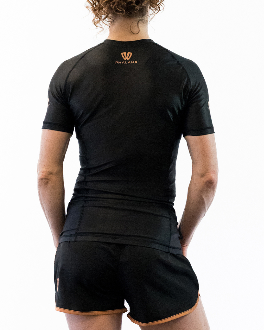 Phalanx Women's Jiu-jitsu BJJ short-sleeve rash guard is perfect for training jiu-jitsu, no-gi grappling, MMA—mixed martial arts, Brazilian Jiu-jitsu, wrestling, and judo. It is also perfect for no-gi JJ or gi jiu-jitsu, and it can be worn at Spartan Race, Tough Mudder, Yoga—all athletics!