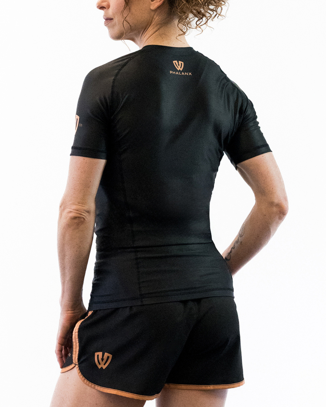 Phalanx Women's Jiu-jitsu BJJ short-sleeve rash guard is perfect for training jiu-jitsu, no-gi grappling, MMA—mixed martial arts, Brazilian Jiu-jitsu, wrestling, and judo. It is also perfect for no-gi JJ or gi jiu-jitsu, and it can be worn at Spartan Race, Tough Mudder, Yoga—all athletics!