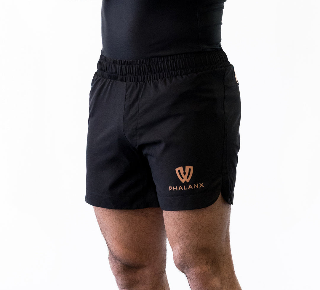 Black and gold no-gi jiu jitsu shorts