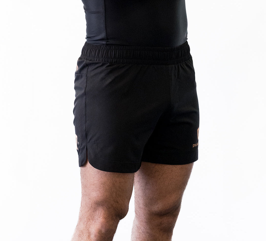 Black and gold no-gi jiu jitsu shorts