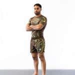 Brown and green no-gi jiu jitsu rash guard and shorts kit