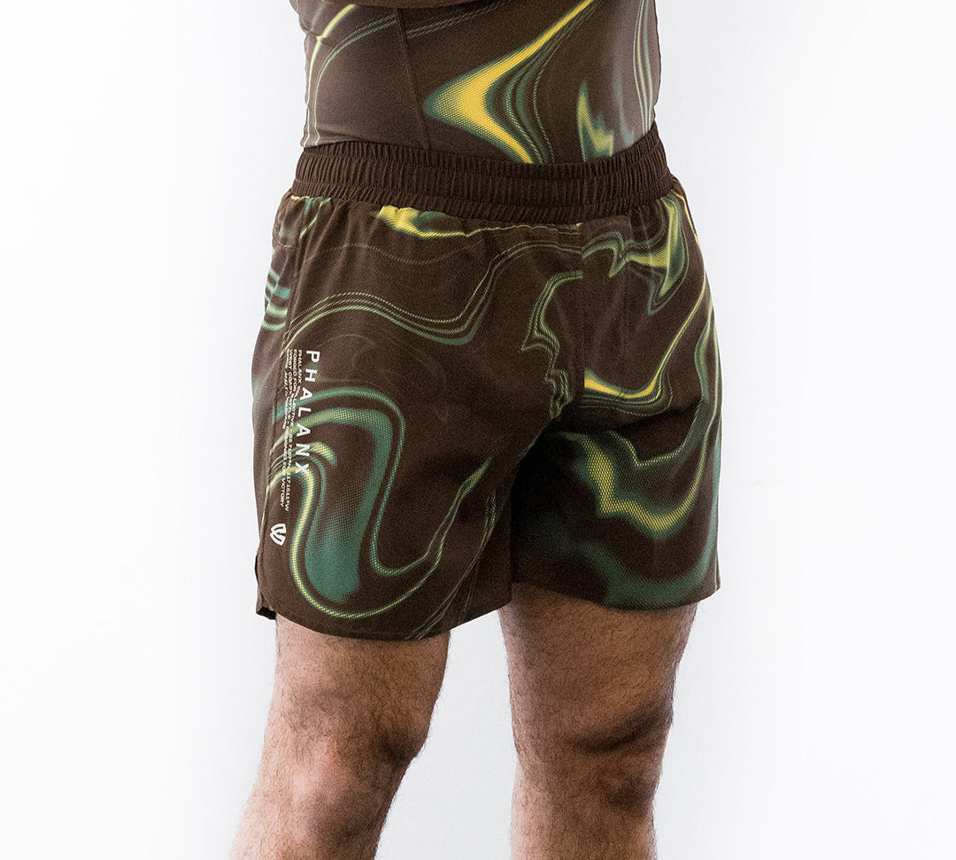 Brown and green no-gi jiu jitsu rash guard and shorts kit