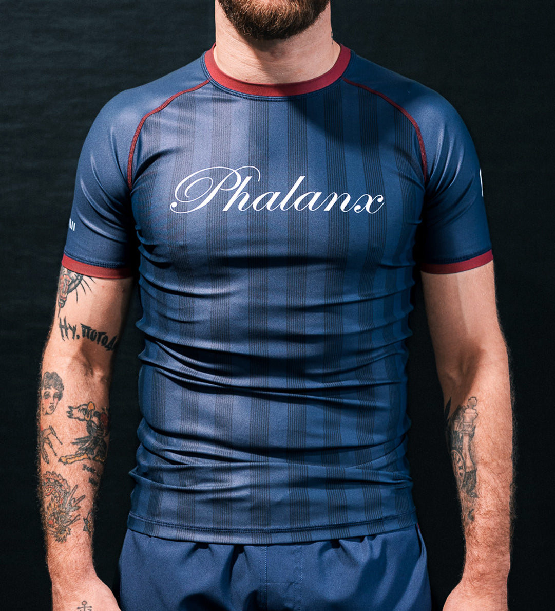 MIDNIGHT SHORT SLEEVE RASH GUARD