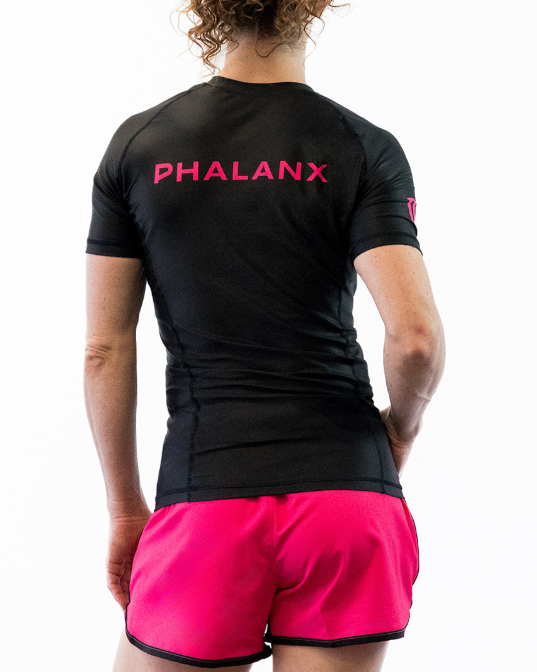 Phalanx Women's Jiu-jitsu BJJ short-sleeve rash guard is perfect for training jiu-jitsu, no-gi grappling, MMA—mixed martial arts, Brazilian Jiu-jitsu, wrestling, and judo. It is also perfect for no-gi JJ or gi jiu-jitsu, and it can be worn at Spartan Race, Tough Mudder, Yoga—all athletics!