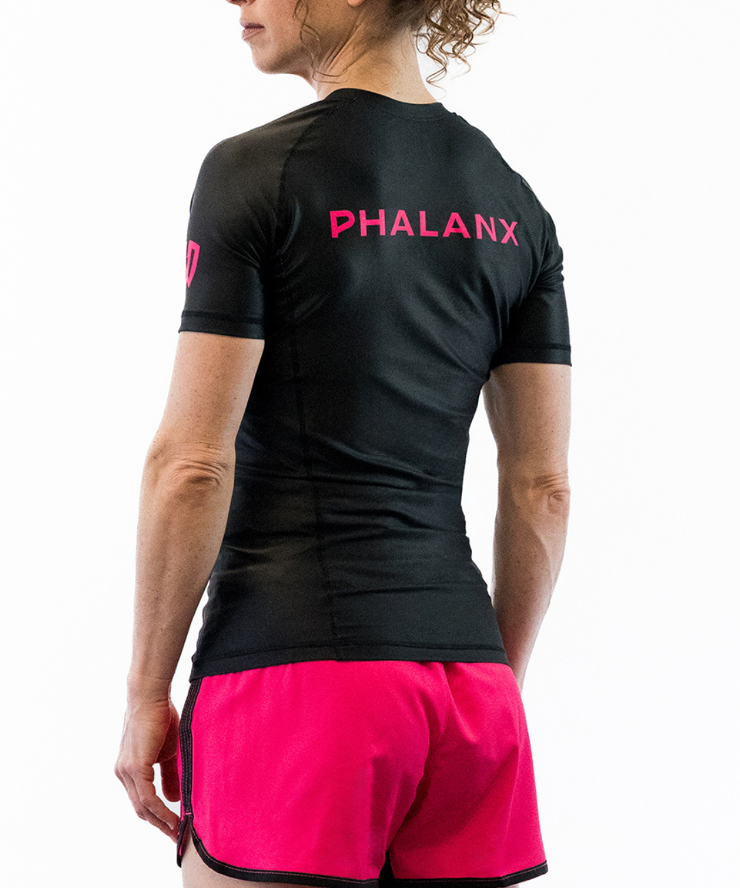 Phalanx Women's Jiu-jitsu BJJ short-sleeve rash guard is perfect for training jiu-jitsu, no-gi grappling, MMA—mixed martial arts, Brazilian Jiu-jitsu, wrestling, and judo. It is also perfect for no-gi JJ or gi jiu-jitsu, and it can be worn at Spartan Race, Tough Mudder, Yoga—all athletics!