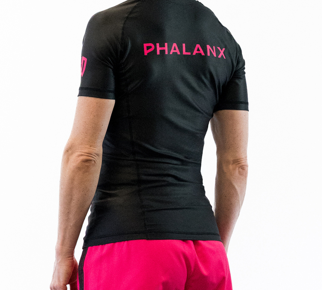 Phalanx Women's Jiu-jitsu BJJ short-sleeve rash guard is perfect for training jiu-jitsu, no-gi grappling, MMA—mixed martial arts, Brazilian Jiu-jitsu, wrestling, and judo. It is also perfect for no-gi JJ or gi jiu-jitsu, and it can be worn at Spartan Race, Tough Mudder, Yoga—all athletics!