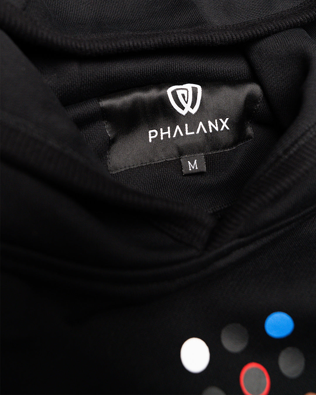 Phalanx Jiu Jitsu premium black oversized hoodie with ranked print, fully enclosed front pocket & patchwork. Made from uniquely sourced premium French terry fabric. High-level Brazilian Jiu-jitsu athletic apparel, the best brand in No Gi.