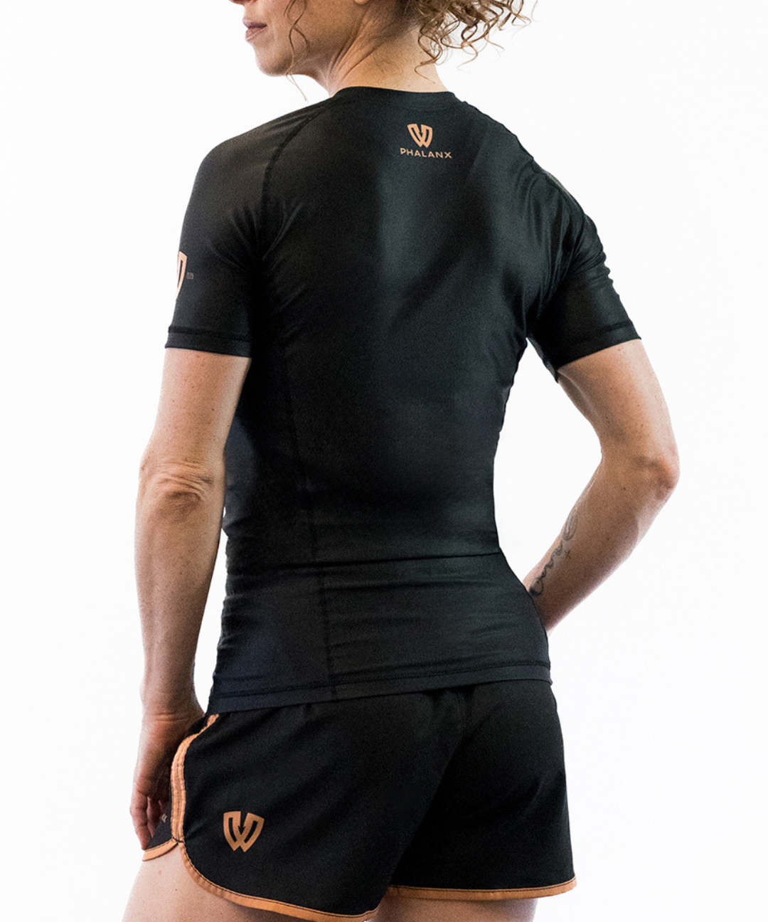 Phalanx Women's Jiu-jitsu BJJ short-sleeve rash guard is perfect for training jiu-jitsu, no-gi grappling, MMA—mixed martial arts, Brazilian Jiu-jitsu, wrestling, and judo. It is also perfect for no-gi JJ or gi jiu-jitsu, and it can be worn at Spartan Race, Tough Mudder, Yoga—all athletics!
