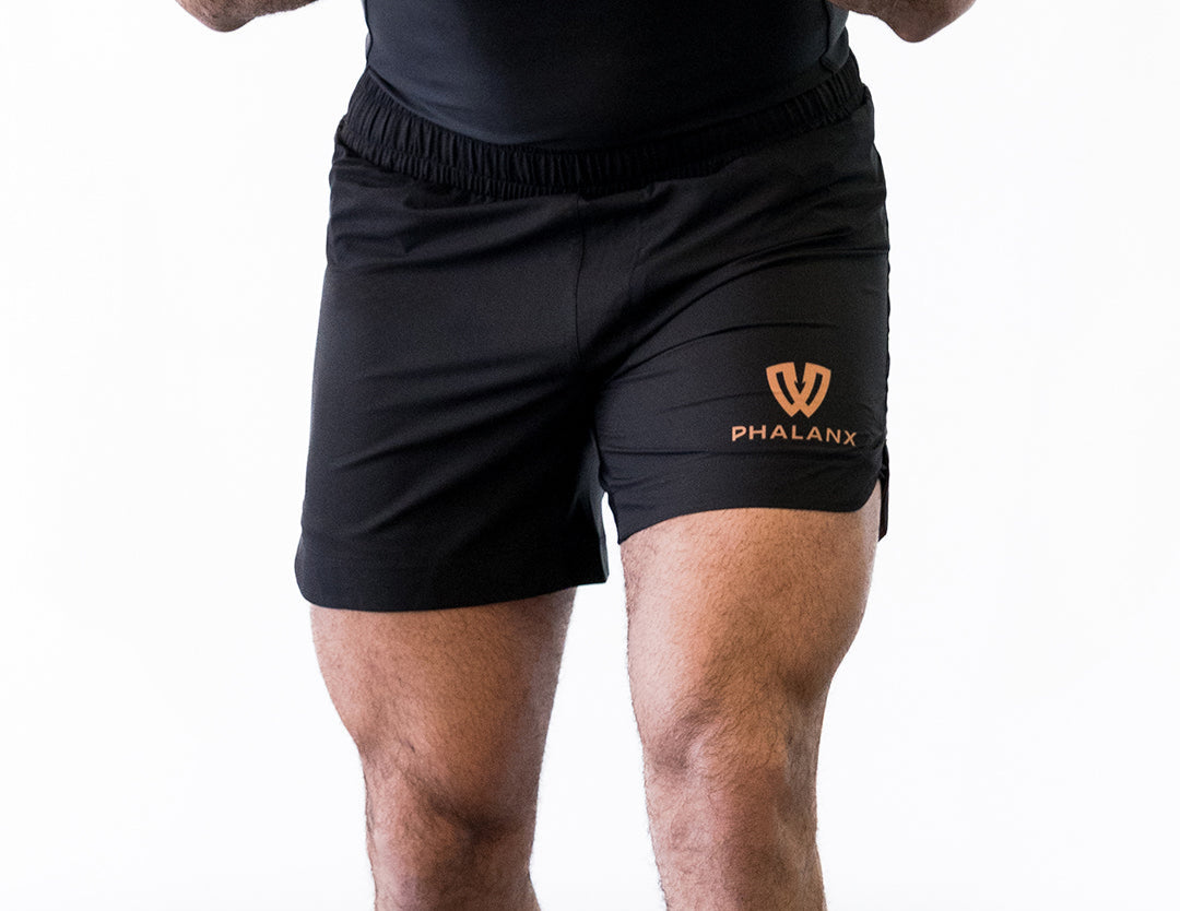 Black and gold no-gi jiu jitsu shorts