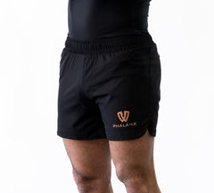 Black and gold no-gi jiu jitsu shorts