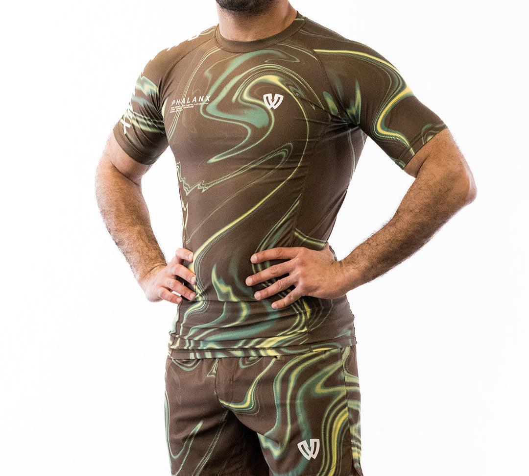Brown and green no-gi jiu jitsu rash guard and shorts kit