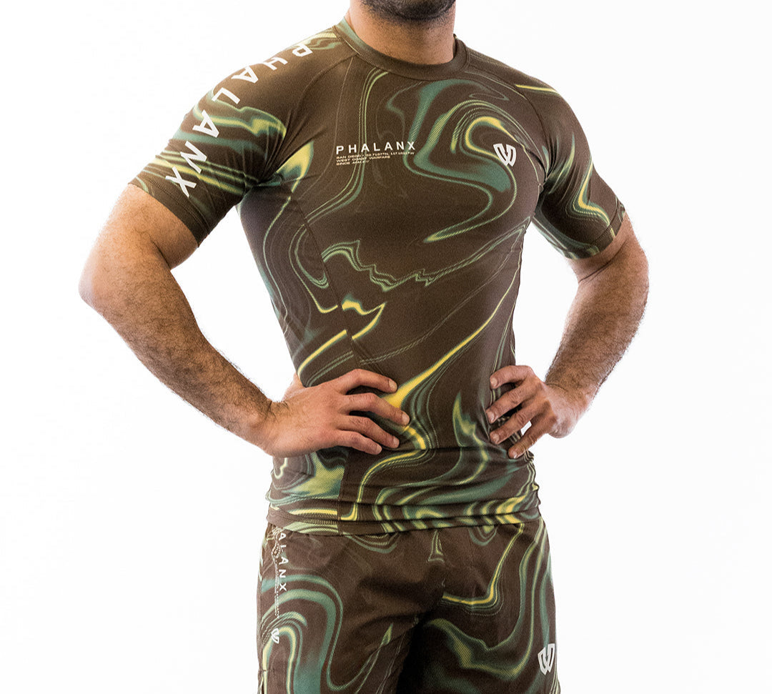 Brown and green no-gi jiu jitsu rash guard and shorts kit